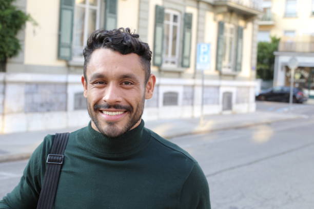 istock Handsome entrepreneur walking around downtown 1414971623