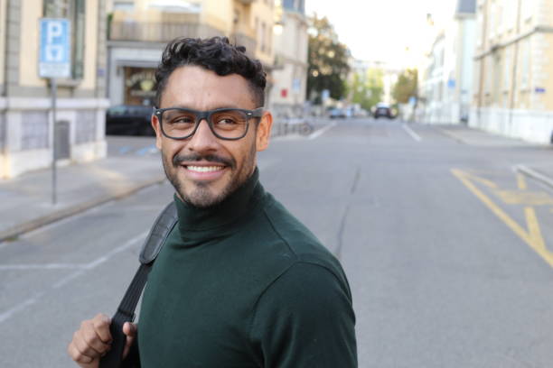 istock Man wearing eyeglasses and elegant turtle neck sweater 1414971647