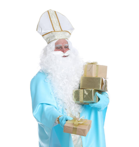 istock Portrait of Saint Nicholas with presents on white background 1414973430