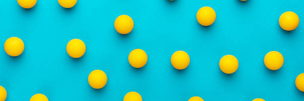istock Many balls for table tennis on turquoise blue background 1414974518