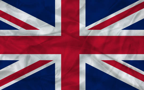 istock Great Britain, United Kingdom flag with waving fabric texture 1414974573