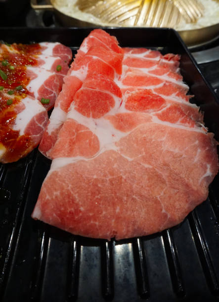 istock Raw meat for BBQ in black tray 1414974648