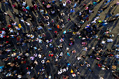 disco night people dancing in crowd top view. people are blurred into motion