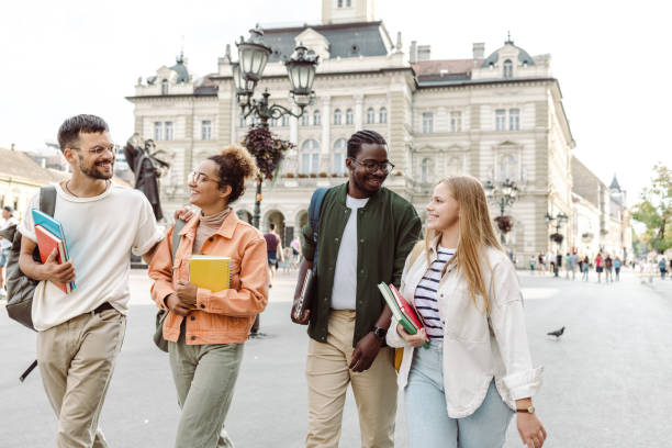 istock Group of international students having fun after class 1414982614