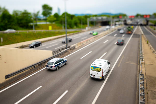 Vienna, Austria - June 5, 2020: Traffic on the A22 motorway in Vienna on a sunny day in spring. This is one of Vienna's most important transit routes along the river Danube.