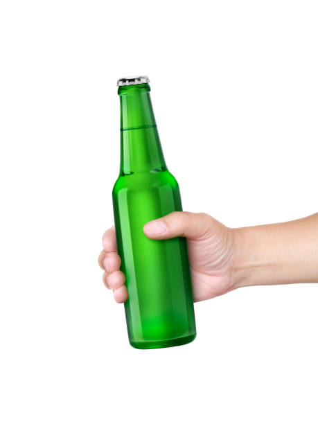 istock A man holding Beer bottle isolated on white background 1414986287