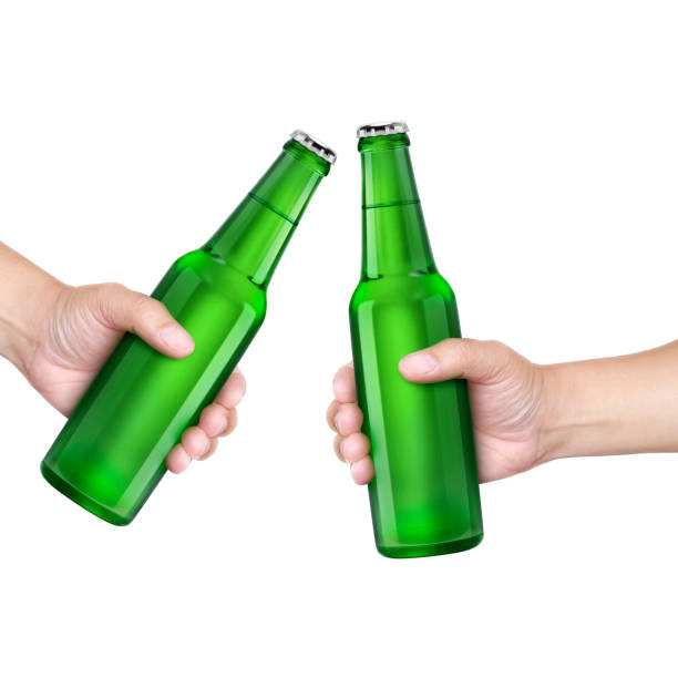 istock A man holding Beer bottle isolated on white background 1414986385