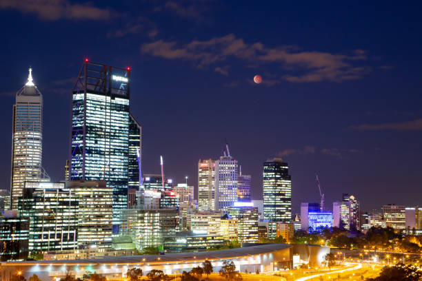 istock Beautiful image of full moon and Lunar Eclipse over Perth city, Western Australia 1414987890