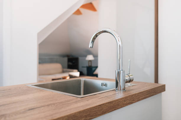 Modern kitchen faucet and sink stock photo