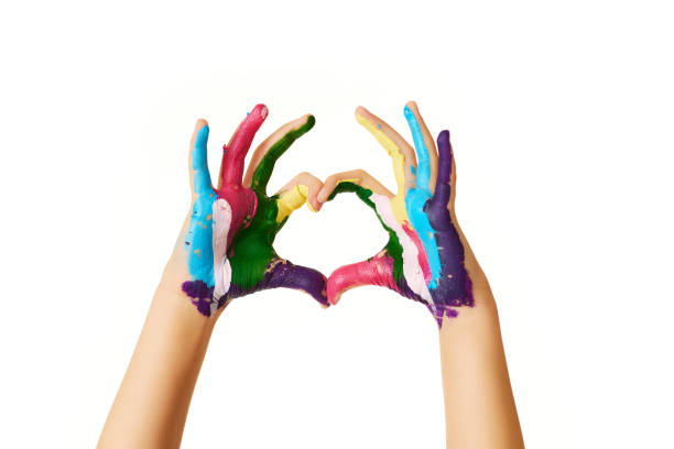 istock child hands painted in colorful paint make heart shape 1414989997
