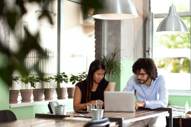 istock Business partners meeting in cafe 1414991549