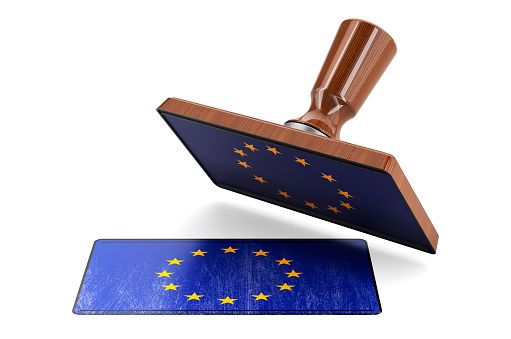 Wooden stamper, seal with the EU flag, 3D rendering isolated on white background