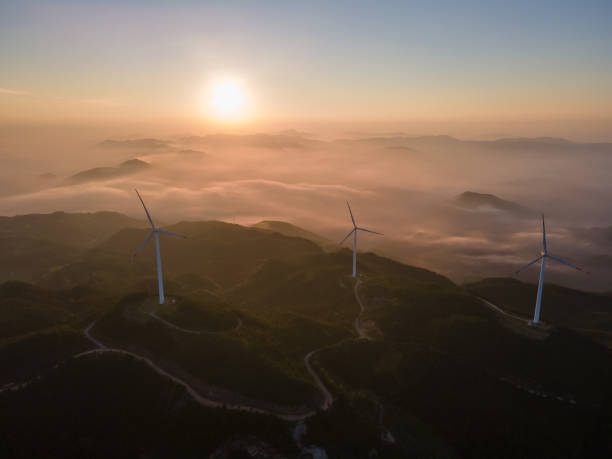 istock New energy wind power generation on the mountain at sunrise 1414993056