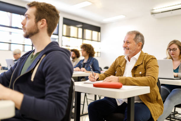istock Older man enjoying his class at university 1414996778