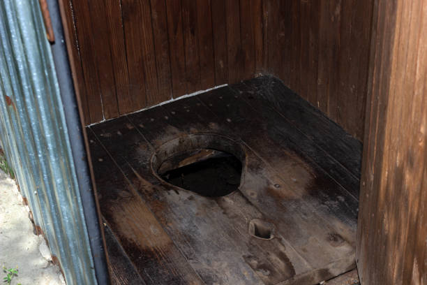 istock rustic wooden toilet, close-up 1414998327