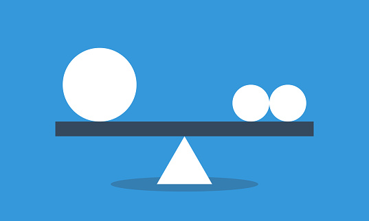 One big and two small balls in equilibrium on seesaw. Concept of harmony and balance. Vector flat style infografics illustration.