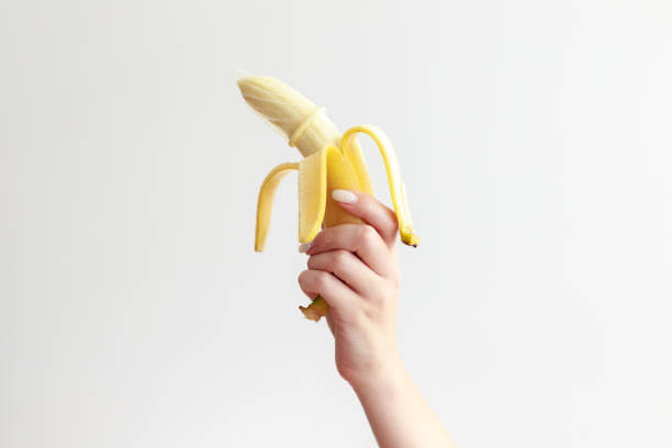 istock banana in a condom on a white background 1415004139