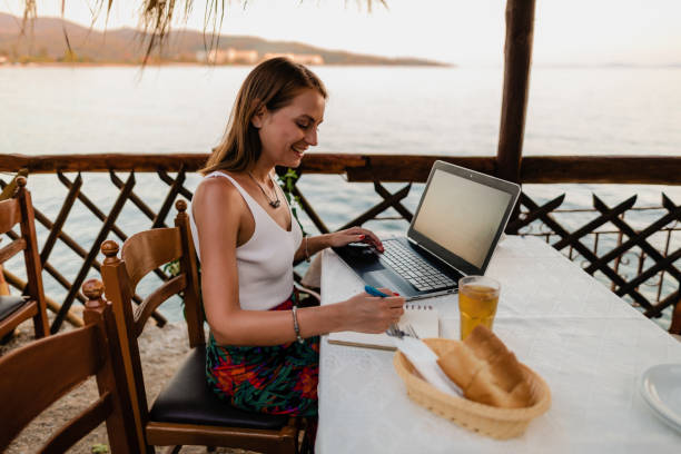 istock Studying and doing homework during a summer vacation at the seaside 1415008183