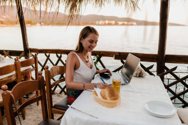istock Studying and doing homework during a summer vacation at the seaside 1415008224