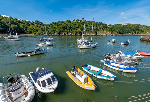 Boats moored in Fishguard Harbour in Wales