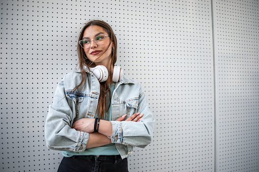Portrait of young woman with headphones