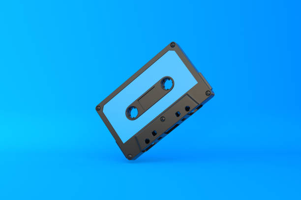 istock Vintage audio tape cassette on a blue background 1415016879