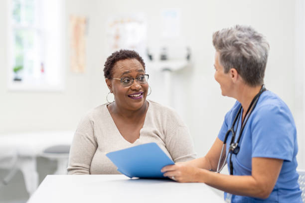 istock Nurse Meeting with a Senior Patient 1415019813