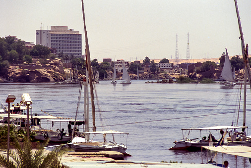 Aswan, Egypt - aug 12, 1991: modern hotels were built on the Nile, in Aswan where the first cataract is located and today the modern dam.