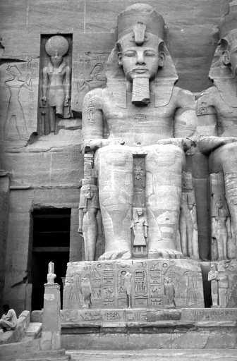 Abu Simbel , Egypt - aug 14, 1991: huge statues of Ramses II testify to the power of the most famous pharaoh in Abu Simbel, an outpost in the desert of his great kingdom