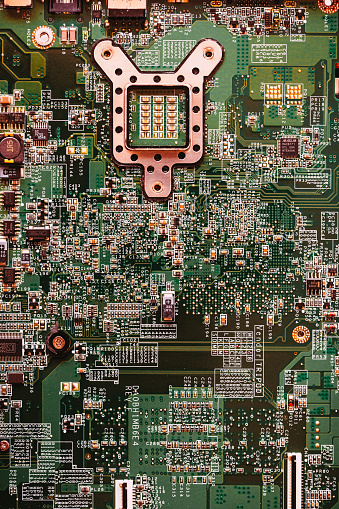 Close up abstract macro color image depicting the circuits and components inside a laptop computer.