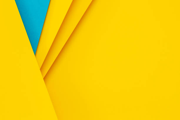 istock Abstract colored papers geometry flat lay composition background with blue and yellow colors 1415025959