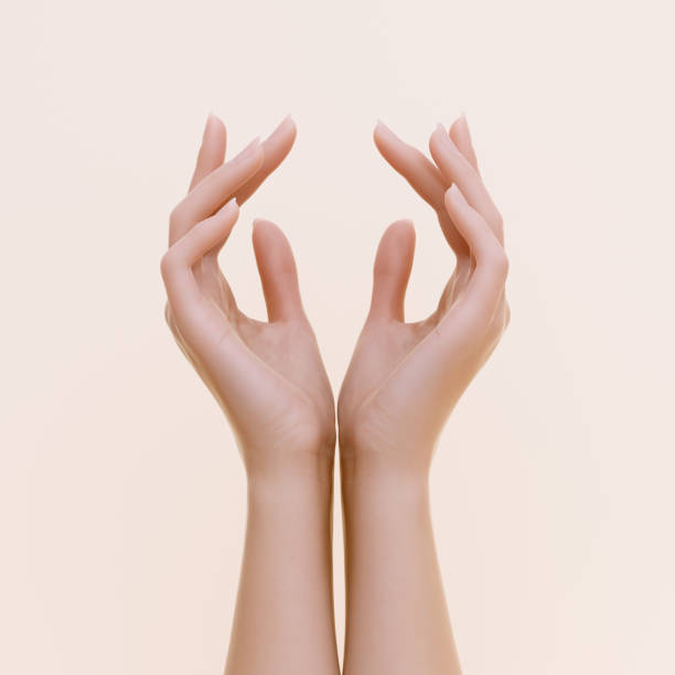 istock beauty product holding hands, two beautiful arms up cupped, 3d rendering 1415027329