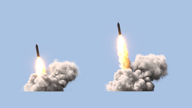 lançamento de foguete balístico em fundo azul - thrust - fotografias e filmes do acervo