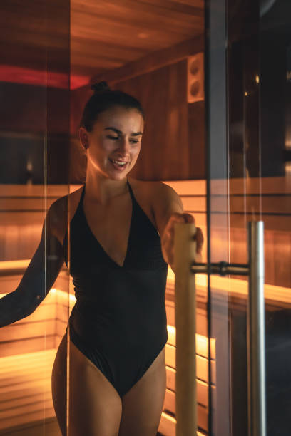 istock A young woman having rest in sauna alone. 1415032509