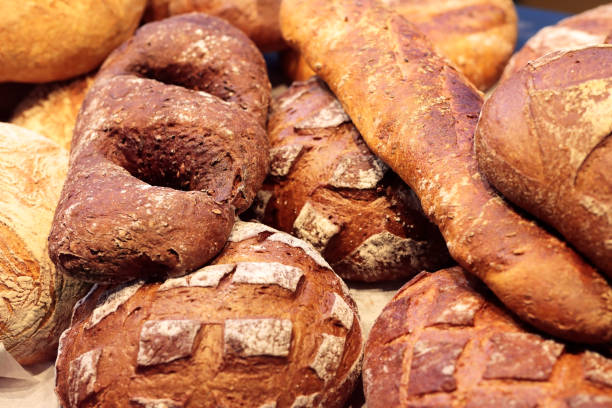 istock varied bread loaves on a bakery shop counter 1415035938