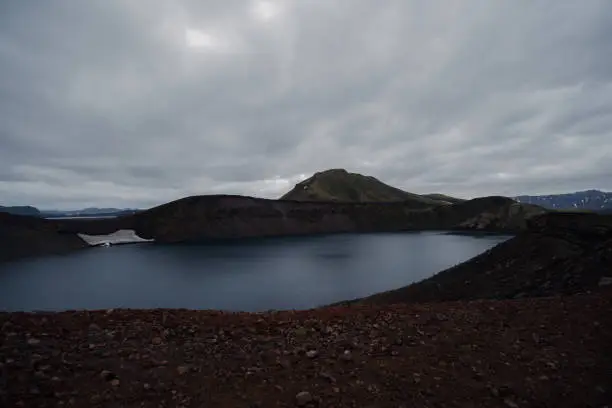 A cold lake in Lamdmanaleuga. Around is lava rock