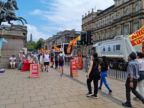 Scottish Socialist Party asking passers by to sign their petition regarding ending fuel poverty.