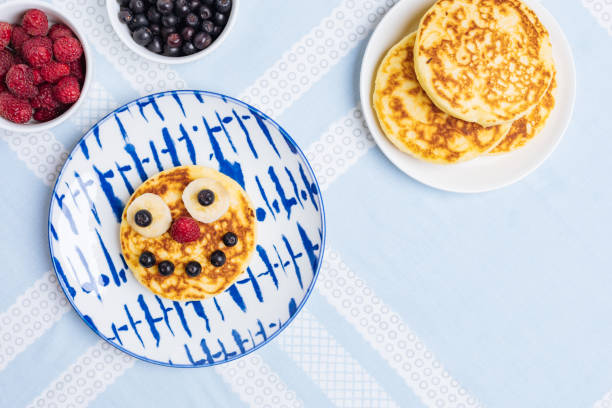 istock American Pancakes for Kids on blue background 1415044709