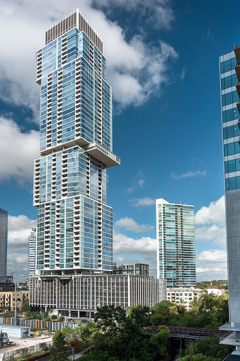 Modern glass apartments and condominiums in the downtown core of the city of Austin Texas USA