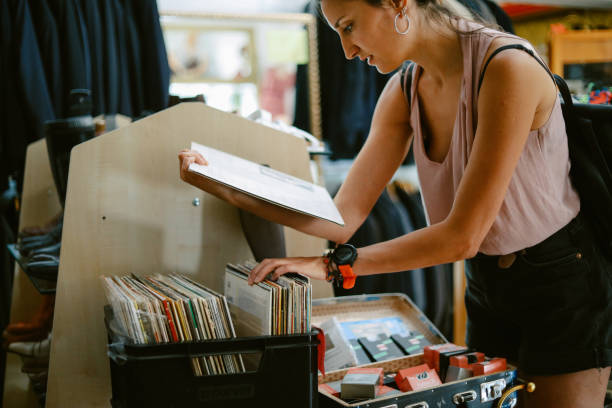istock browsing music at the vinyl records shop 1415049998