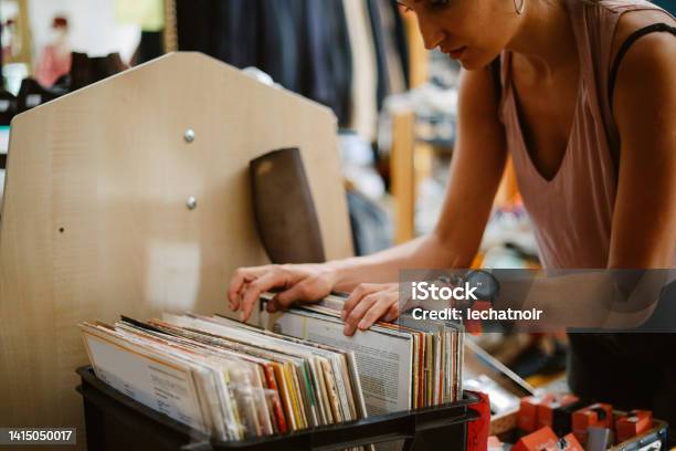 Browsing Music At The Vinyl Records Shop Stock Photo - Download Image Now - Record - Analog Audio, Shopping, Berlin