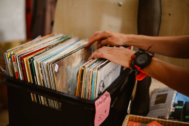 istock looking through the used vinyl records 1415050146