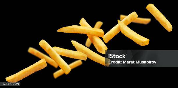 Delicious Potato Fries On Black Stock Photo - Download Image Now - Appetizer, Black Color, Close-up
