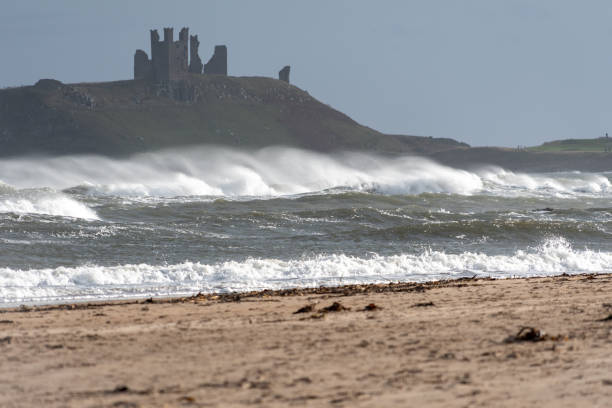 istock Dunstanburgh Castle viewed from Embleton Bay 1415053016