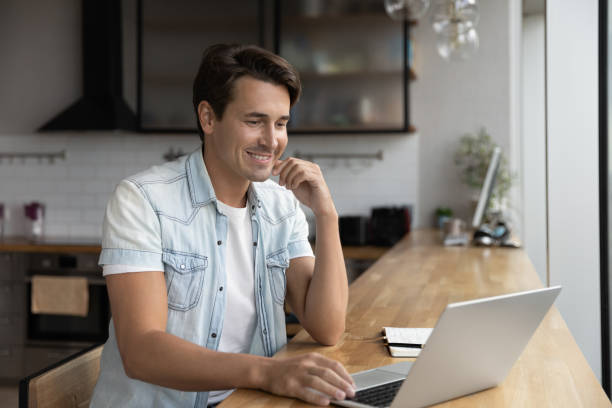 istock Happy self employed business professional working from home 1415053570