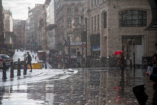 City of London, United Kingdom - June 30, 2022: Rain over Ludgate Hill over Fleet Street