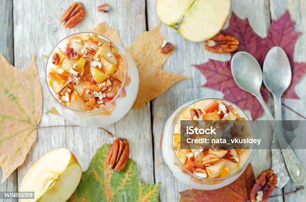 Caramelized Apple Pecan Greek Yogurt Parfait In A Glass Stock Photo - Download Image Now