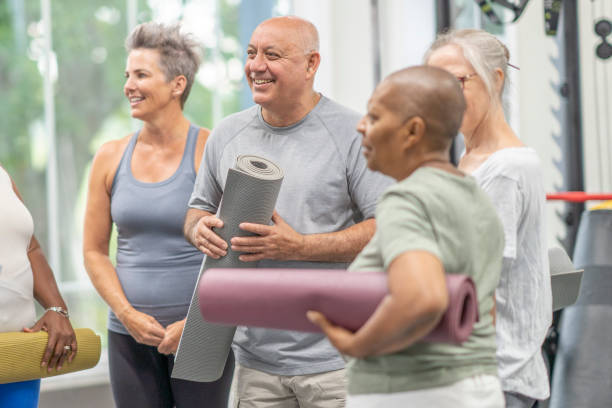 istock Seniors Talking after Yoga Class 1415055267