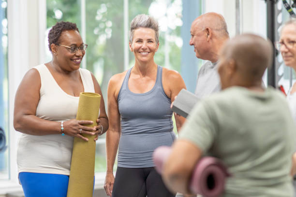 istock Seniors Talking after Yoga Class 1415055273