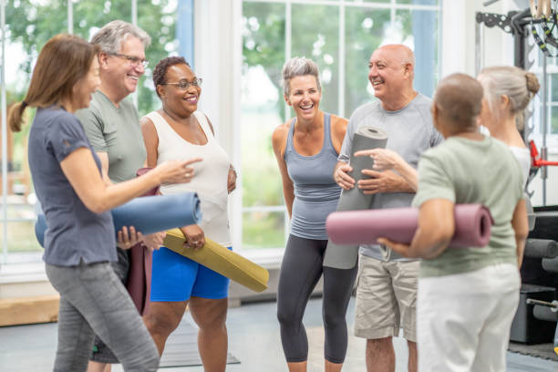 istock Seniors Talking after Yoga Class 1415055293